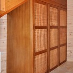 Шкаф под лестницу с филенчатыми фасадами плетеными из лозы. п. Пески